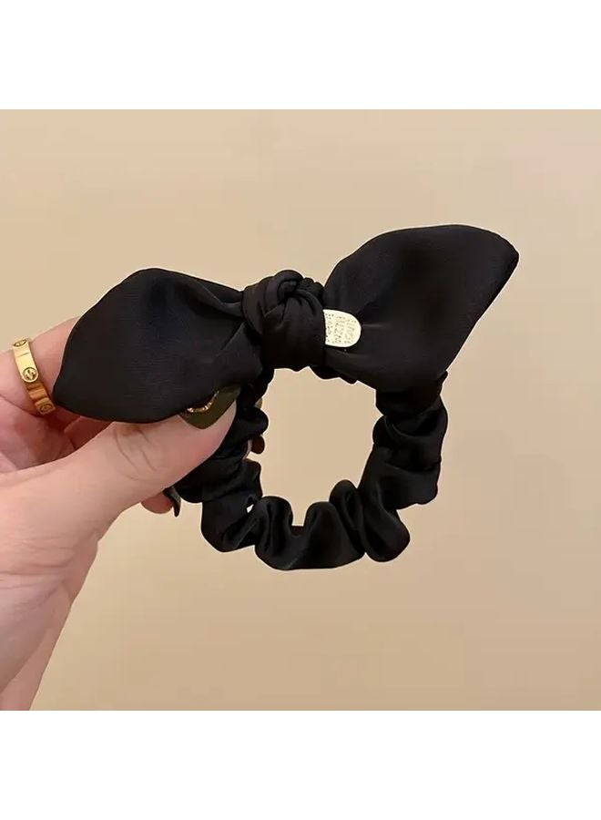 Black Satin Bow Hair Tie Scrunchie For Women And Teens With Golden Accents - Image 3